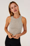 The model is wearing a SPLITS59 Kiki Rib Crop Tank - Heather Grey designed for gym workouts and black leggings.