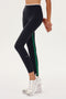 A woman wearing Easton Rigor High Waist 7/8 - Black/White high waist leggings by SPLITS59.