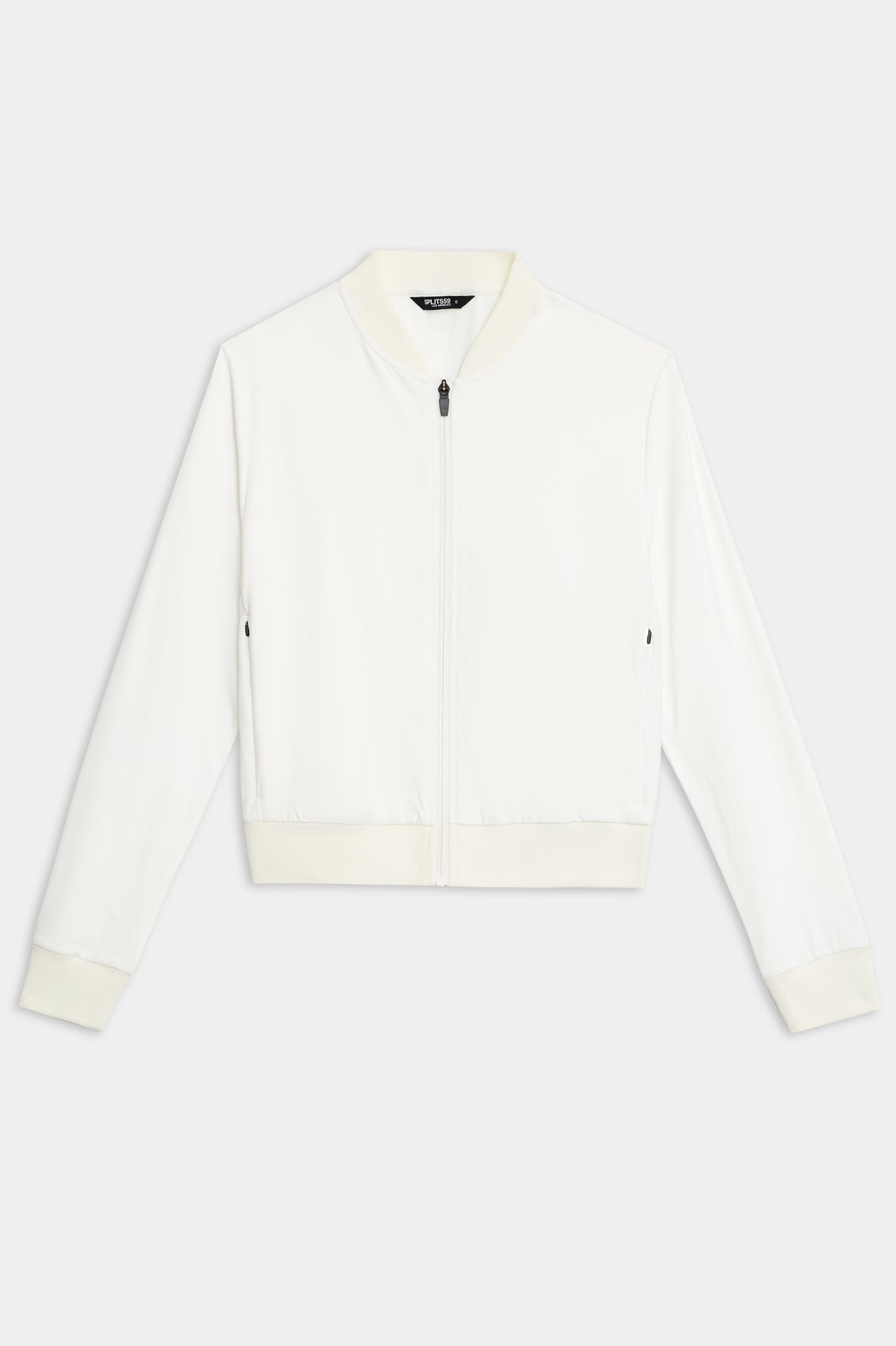 The Airweight Bomber Jacket in white by SPLITS59 features a front zipper and ribbed cuffs, set against a plain background.