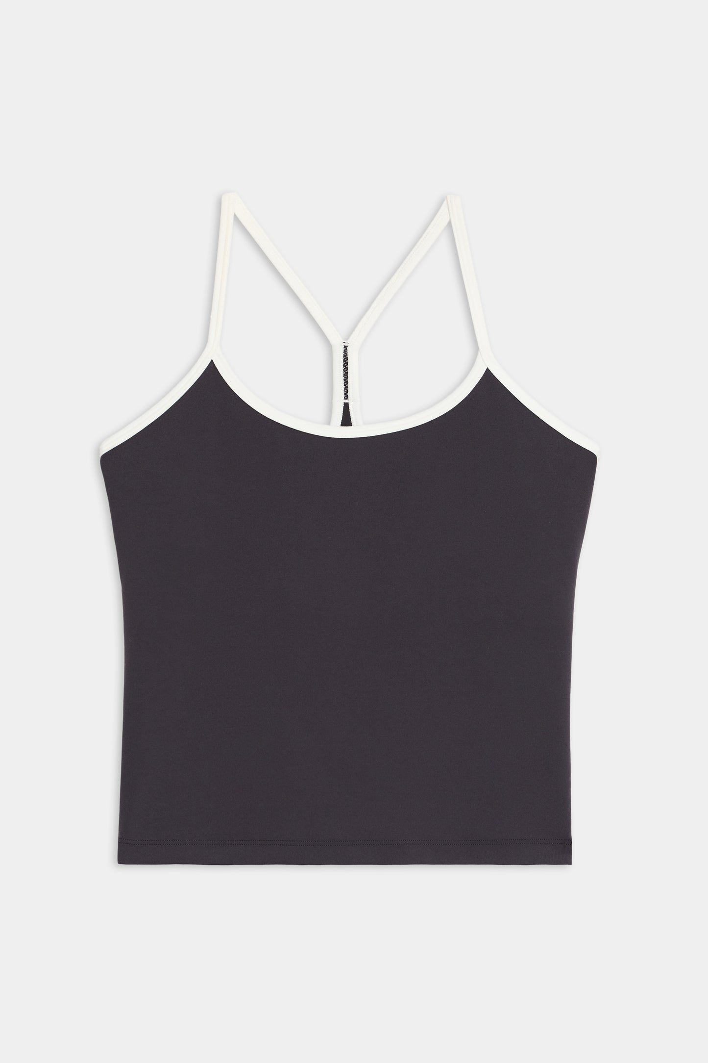 The SPLITS59 Airweight Tank is a black cropped top featuring white spaghetti straps and a white trim, displayed against a plain white background.