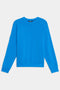The SPLITS59 Andie Fleece Sweatshirt - Riviera is a bright blue, long-sleeve crewneck pullover with a classic fit, made in Los Angeles and shown laid flat on a white background.