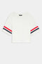 A white short-sleeve crop top with red and navy blue horizontal stripes on each sleeve, displayed against a plain background.