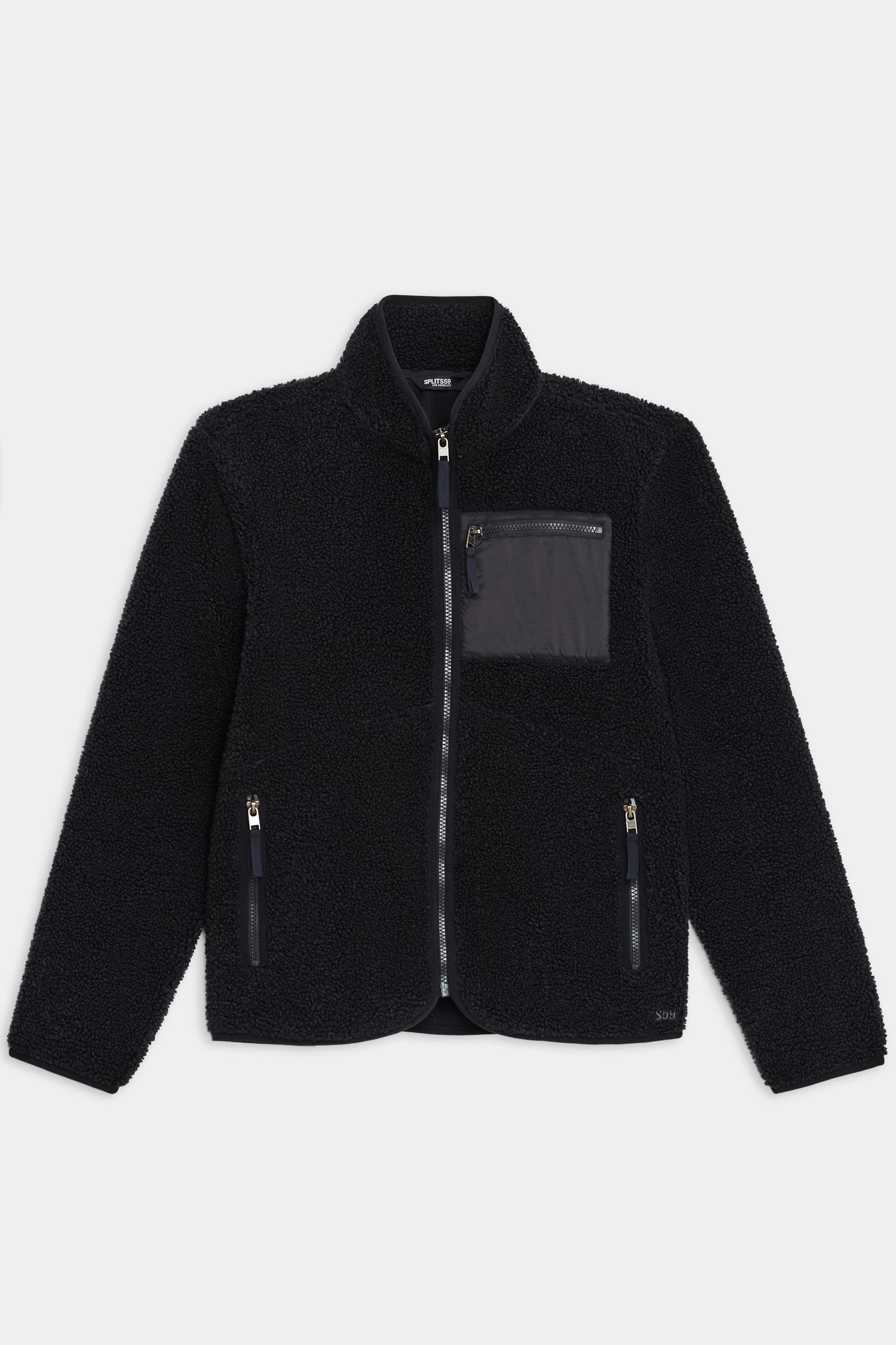 The SPLITS59 Harris Sherpa Jacket, a black zip-up fleece with stand collar, two zippered side pockets, and a gray chest pocket, is shown laid flat on a white background.