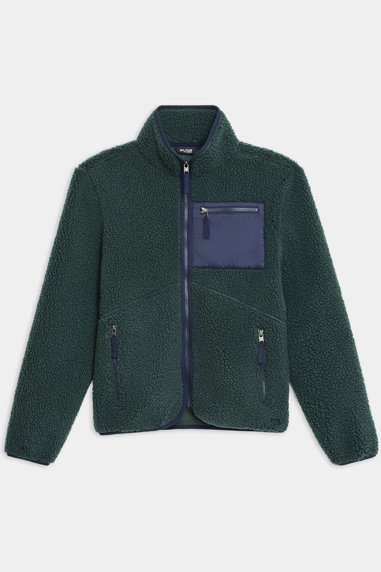 The SPLITS59 Harris Sherpa Jacket features a forest green fleece, stand collar, blue zip closures, two front pockets, and a contrasting blue chest pocket.
