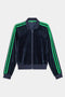 The SPLITS59 Heritage Velour Bomber in Indigo/Grass features green sleeve stripes, a ribbed collar, cuffs, and hem—a plush zip-up jacket ideal for workout layering—shown laid flat on a white background.