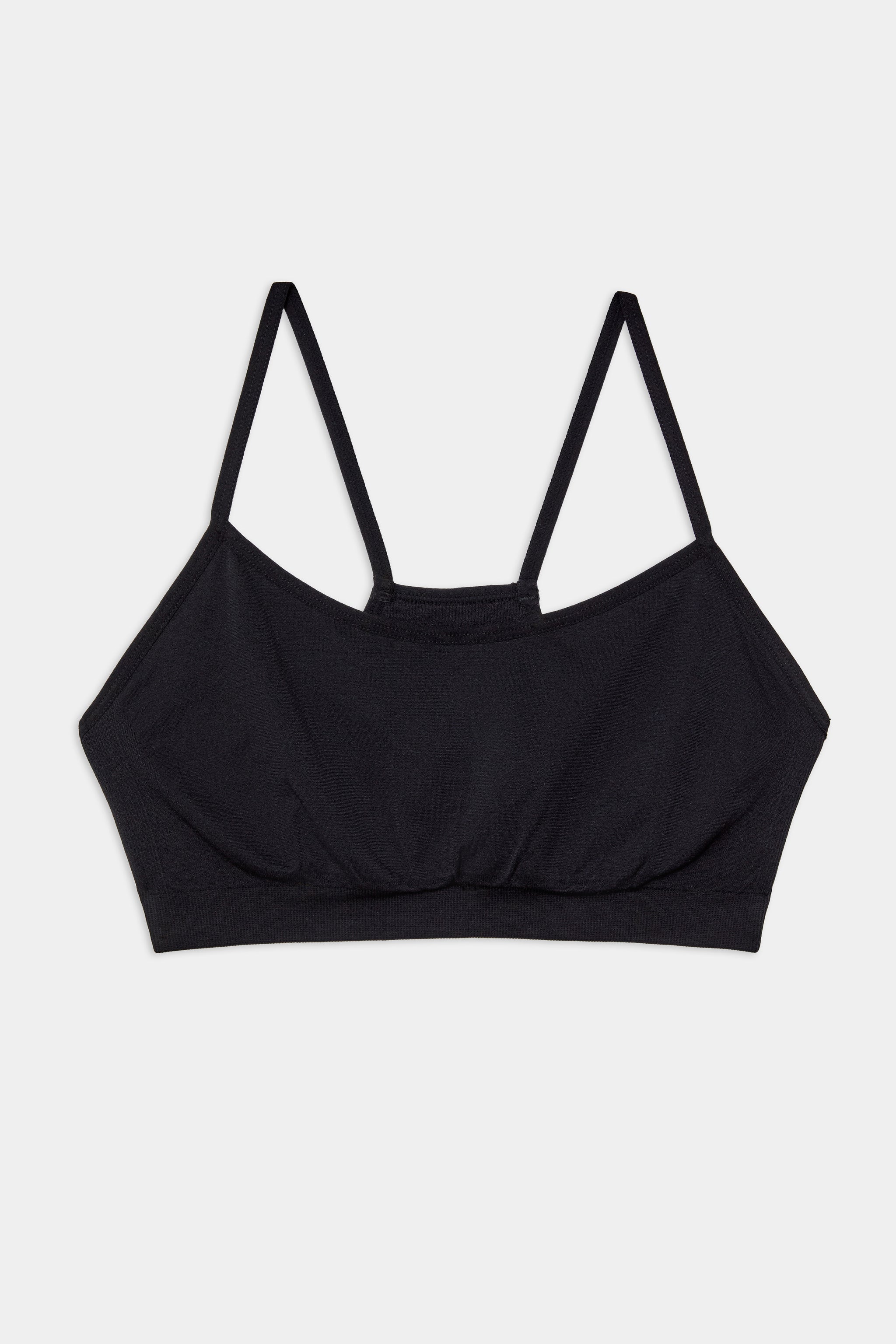 A black bralette with thin adjustable shoulder straps, displayed flat on a white background.