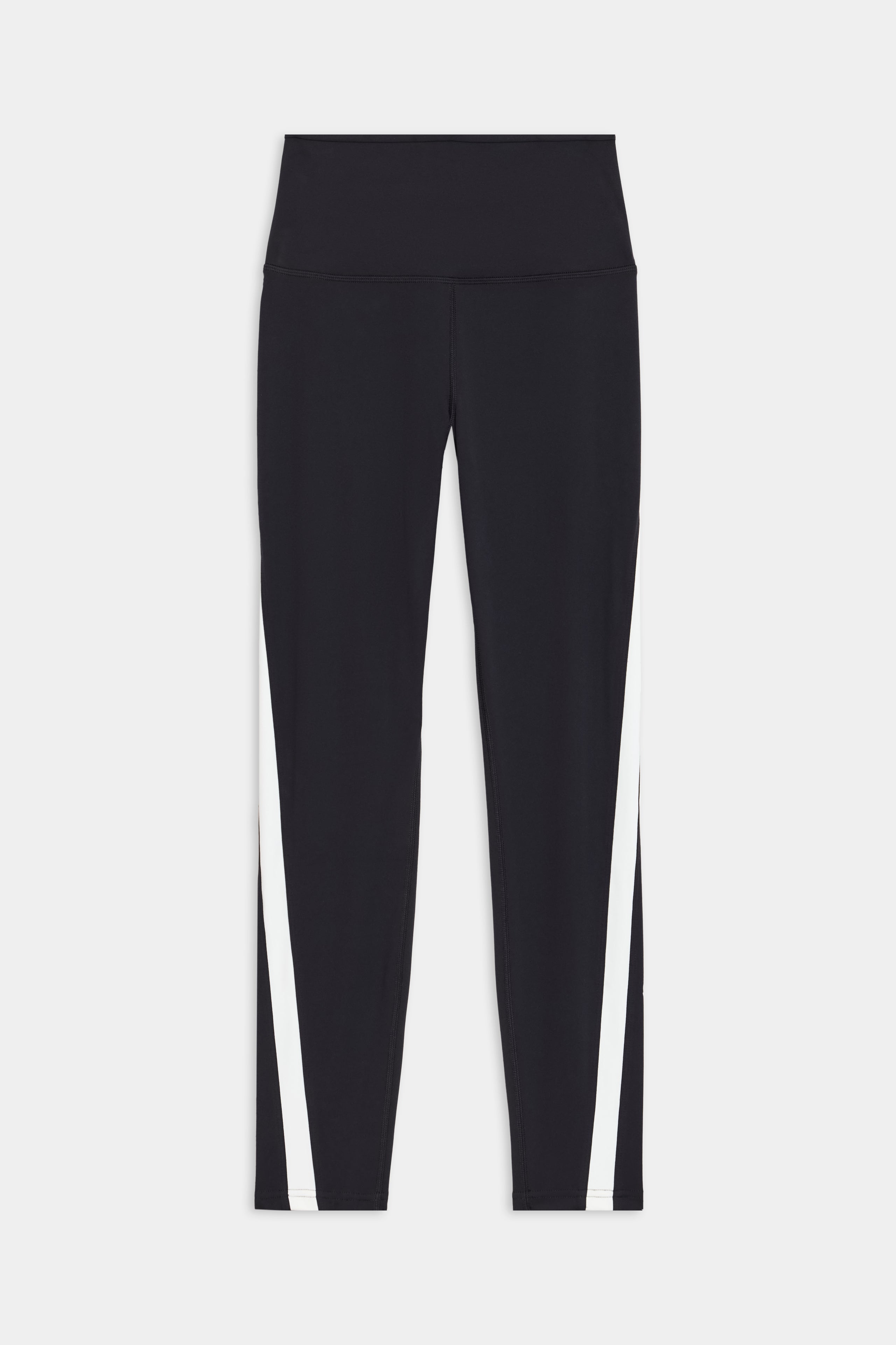 The Miles High Waist Rigor 7/8 leggings from SPLITS59 feature contrasting color stripes on the sides, set against a chic black and white background.