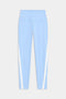 The Miles High Waist Rigor 7/8 leggings by SPLITS59 are light blue with a high waistband and white vertical side stripes, displayed flat against a white background.