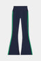 The SPLITS59 Raquel High Waist Flared Legging in Indigo/Grass features green side stripes and ultra-comfortable 4-way stretch fabric—ideal for workouts. Shown laid flat on a white background.