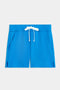 The SPLITS59 Reena Sweatshort - Riviera features a bright blue hue, soft modal-spandex fabric, elastic waistband with white drawstring, two front pockets, and small side slits at the hem.