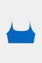 The SPLITS59 Cait Rigor Bra in Classic Blue with white trim, designed for high-impact workouts, features a square neckline and uses durable Rigor fabric.