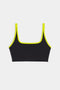 The SPLITS59 Cait Rigor Bra in Black/Chartreuse, perfect for high-impact workouts, is showcased against a white background.