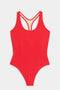The SPLITS59 Suki Airweight Bodysuit is a vibrant red one-piece with a racerback design, shown flat on a white background.