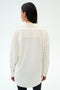 A person with long dark hair wears the SPLITS59 Kate Airweight Lite Button Down in White, facing away from the camera against a plain background—an airy, comfortable layering piece.