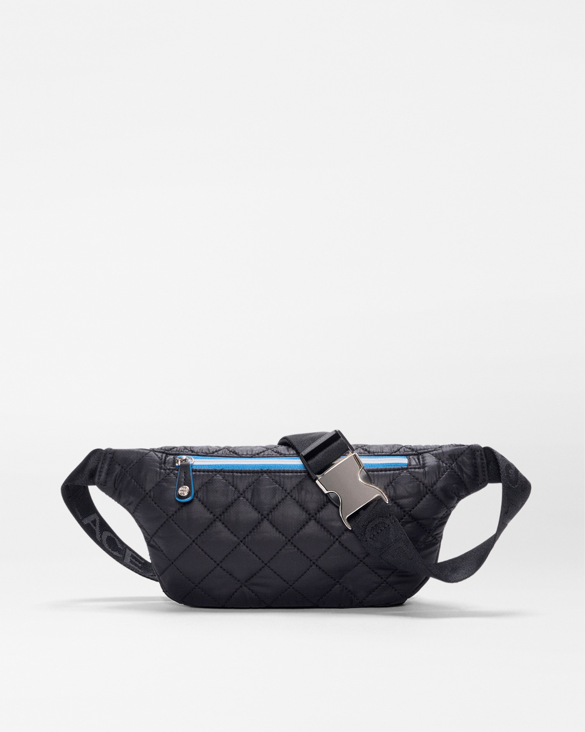 The SPLITS59 MZW x Splits59 Small Metro Sling is a black quilted waist bag with a blue front zip pocket and adjustable buckle strap, shown on a plain white background.