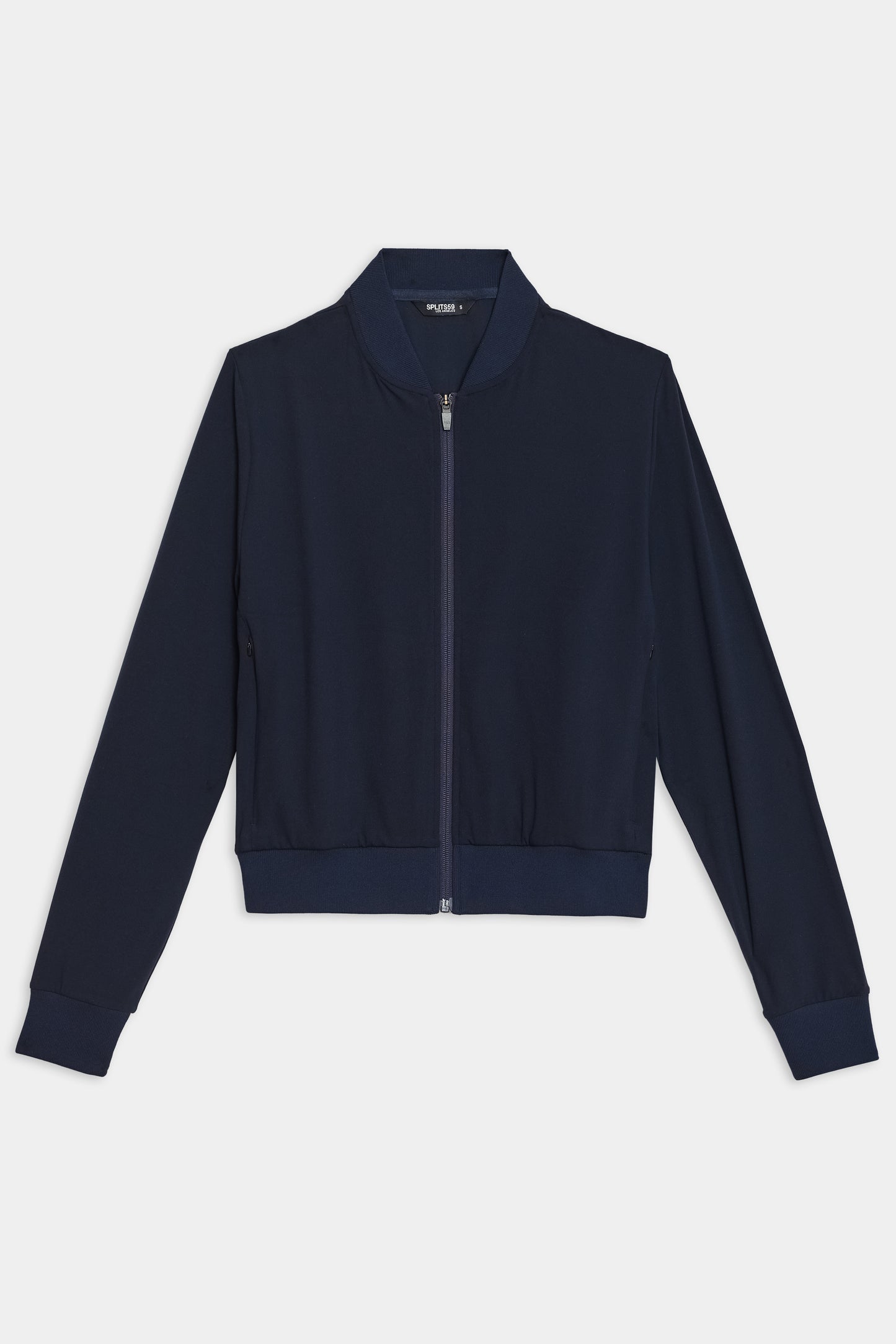 The SPLITS59 Airweight Bomber Jacket in Indigo features a ribbed collar and cuffs, showcased against a plain white background.