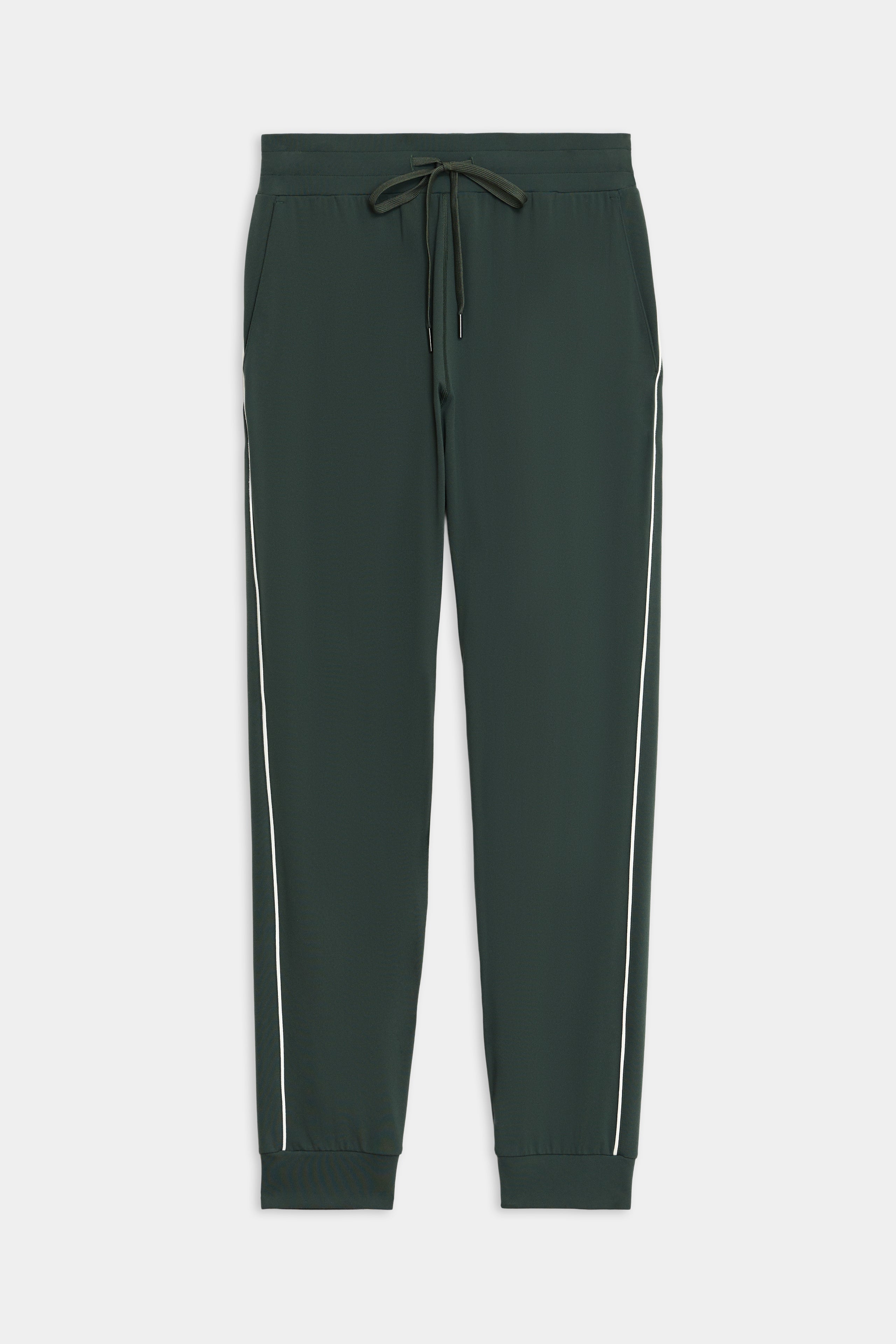 SPLITS59 Airweight Jogger 7/8 with Piping features dark green fabric, white side piping, elastic cuffs and waistband, plus a drawstring.