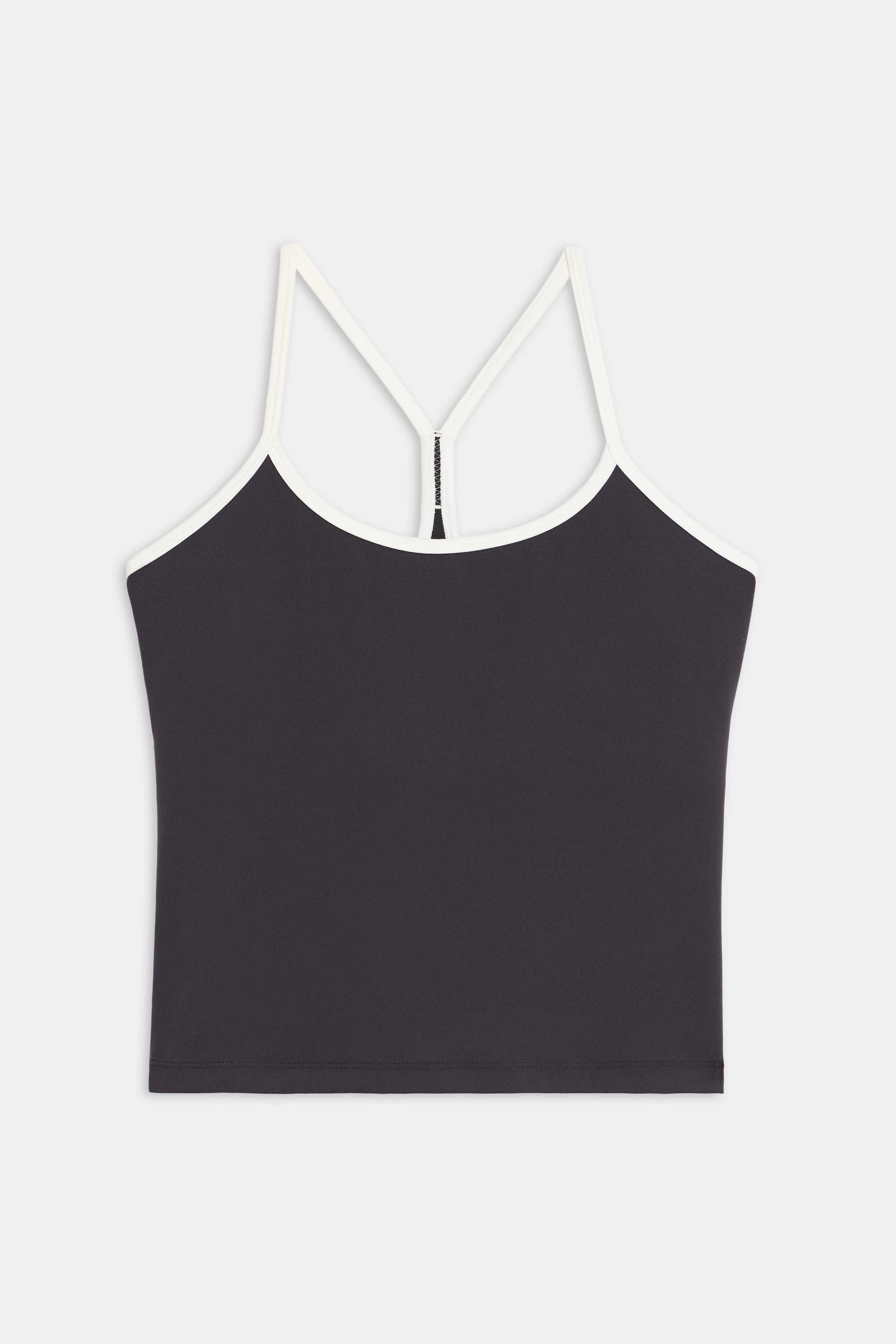 The SPLITS59 Airweight Tank is a black cropped top featuring white spaghetti straps and a white trim, displayed against a plain white background.