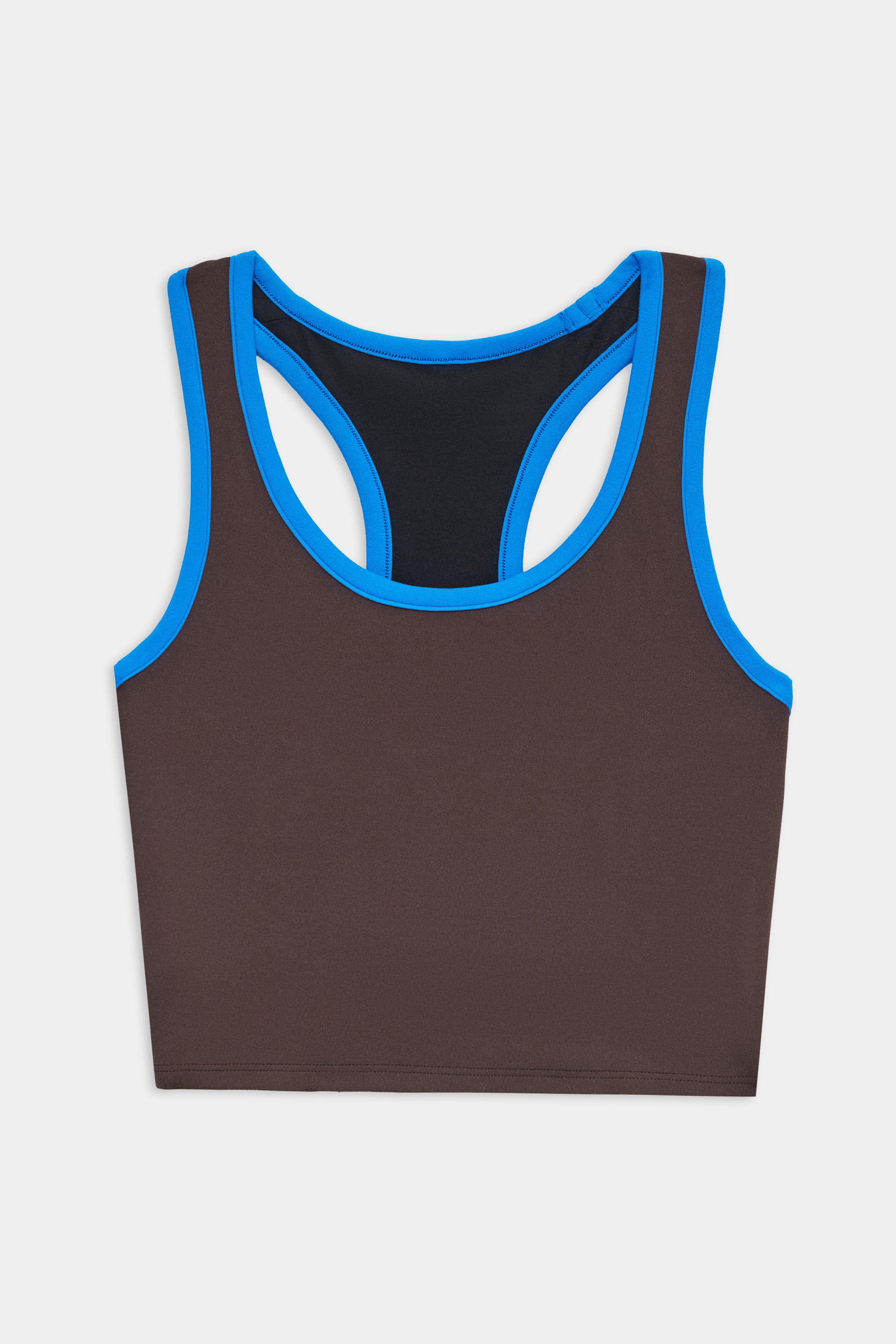 The SPLITS59 Amber Airweight Bralette in Dark Chocolate/Classic Blue, made from Airweight performance fabric with a racerback design, is laid flat on a white background—ideal for hot yoga sessions.