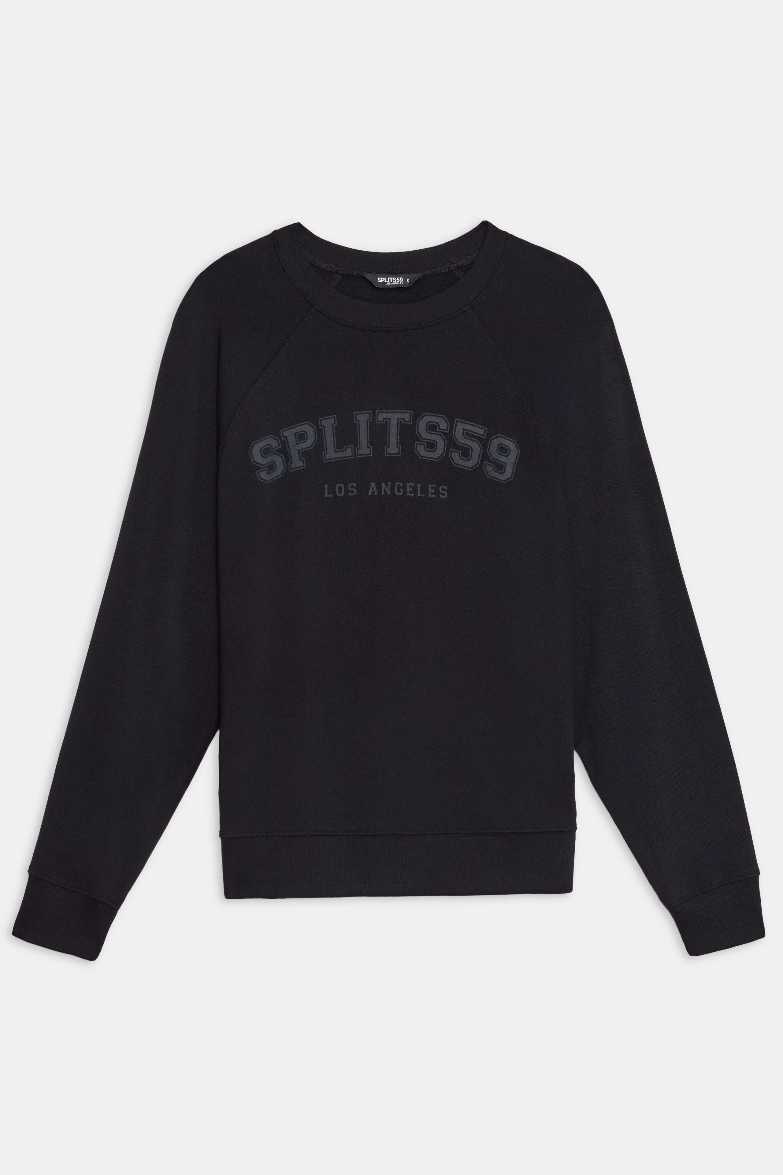 The SPLITS59 Andie Oversized Fleece Varsity Graphic Sweatshirt in black features "SPLITS59 LOS ANGELES" text on the front, made from soft fleece, shown on a plain white background.
