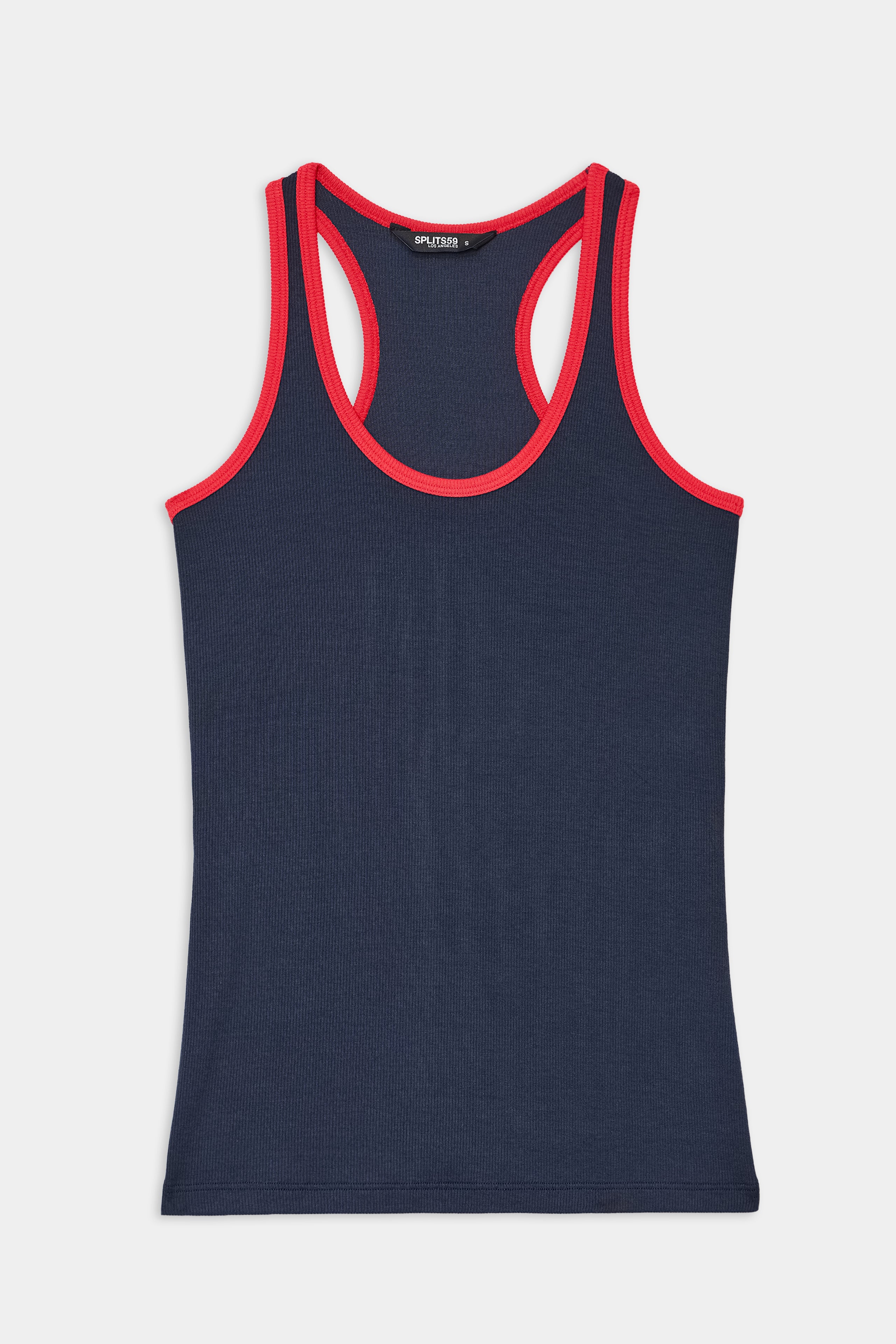The SPLITS59 Ashby Rib Tank in Indigo/Pirate Red features a navy blue ribbed design with red trim at the neckline and armholes, ideal for yoga or gym sessions, shown flat on a white background.