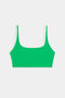 SPLITS59 Cait Rigor Bra in Grass/White, featuring a square neckline and high-performance Rigor fabric, shown on a plain light background.