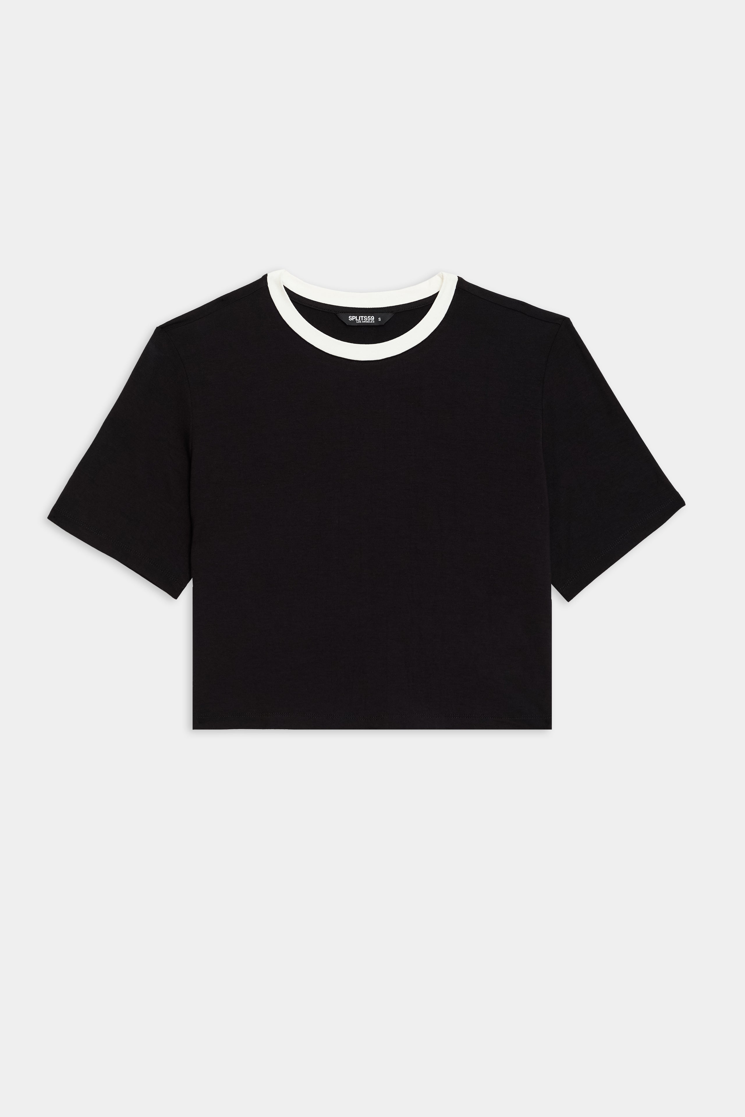 The Djuna Crop Ringer by SPLITS59 is a black short-sleeve crop top with a white crew neck collar, ideal for CrossFit or gym workouts.