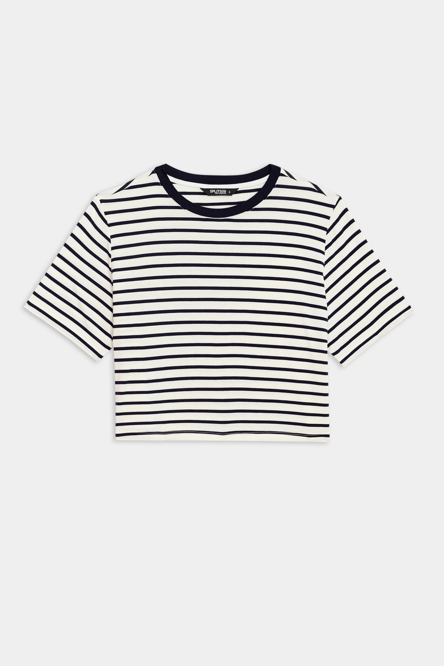 The Djuna Crop Ringer by SPLITS59 is an indigo striped, short-sleeve crop top with a black neckline, perfect for outdoor workouts, set against a plain white background.