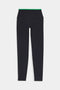 The SPLITS59 Easton Rigor High Waist 7/8 leggings in Black/Grass feature a compressive fit and green waistband, designed for workout support, shown laid flat on a white background.