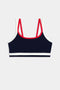 The SPLITS59 Eva Rigor Double Strap Bra in Indigo/White features contrast color accents and double red straps, shown on a plain background—perfect for gym workouts.