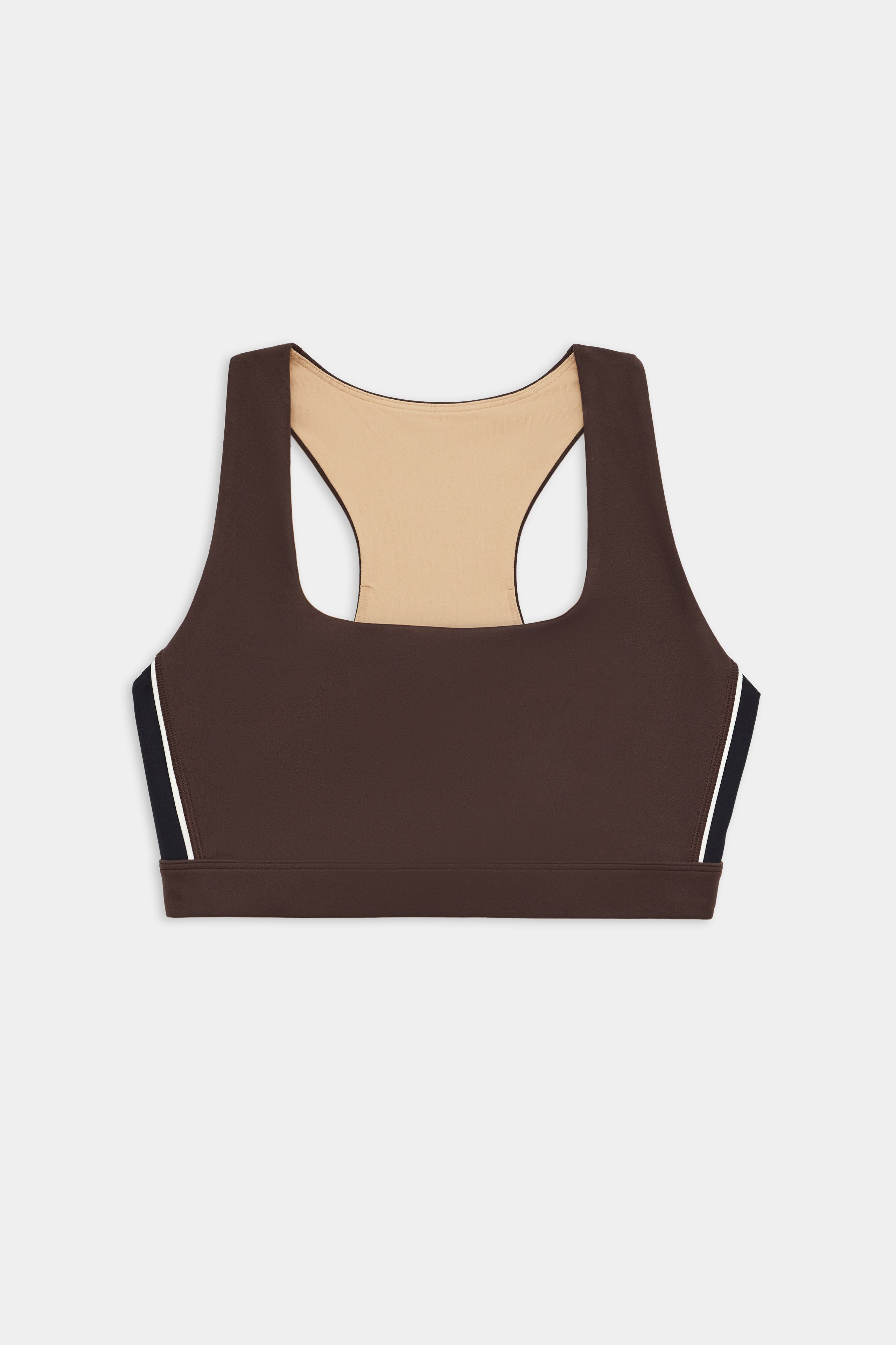 The SPLITS59 Lexi Rigor Bra in Dark Chocolate/Black, designed for high-impact workouts with beige lining and black-and-white side panels, is shown laid flat on a white background.