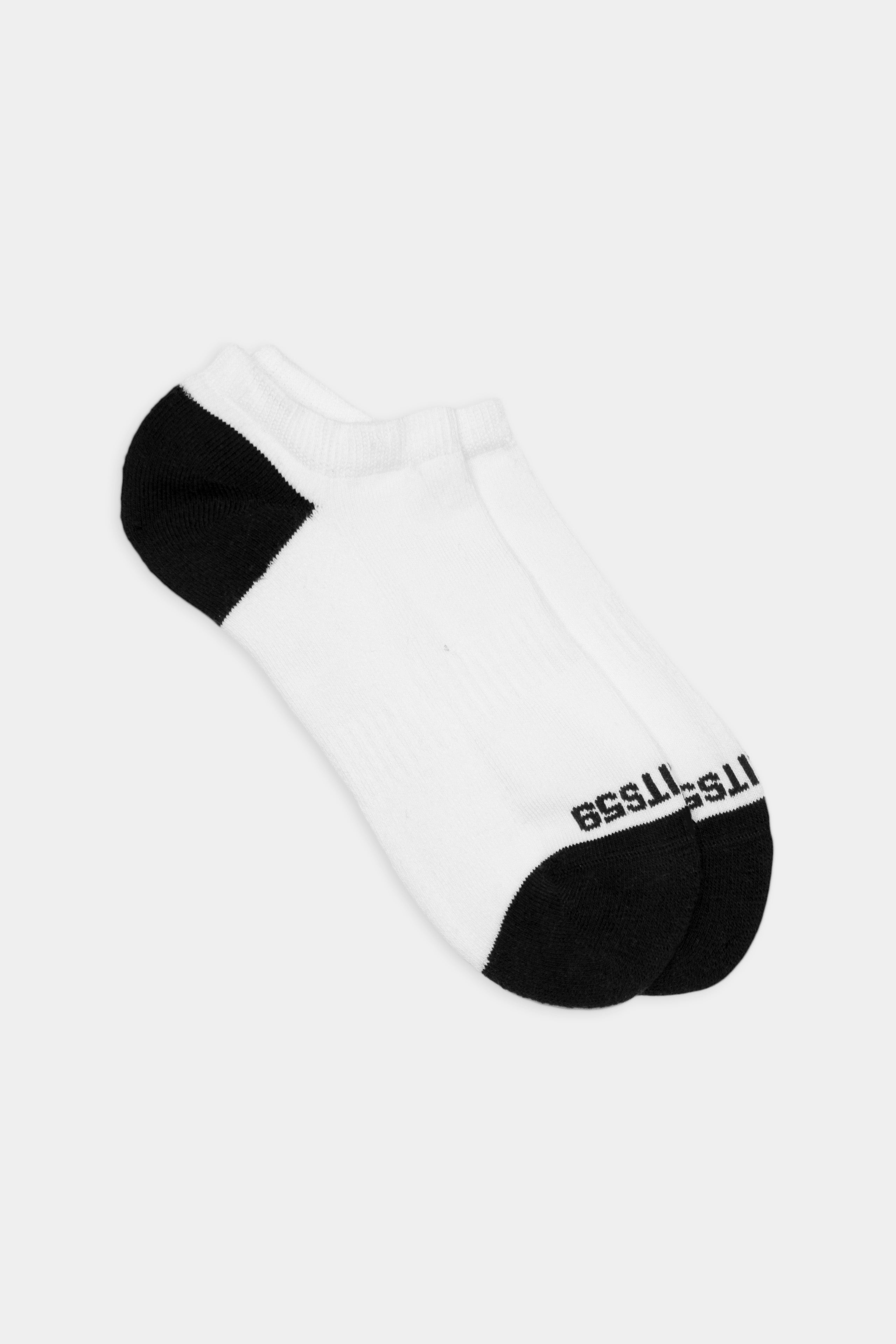 SPLITS59 Logo Ankle Socks in white with black toes and heels, inspired by retro athletic styles, feature text on the soles.