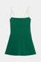 The SPLITS59 Monah Rigor Dress in Arugula/White is a sleeveless piece with an A-line silhouette and white Rigor fabric straps and neckline.