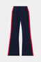 The SPLITS59 Raquel High Waist Crop in Indigo/Pirate Red features 4-way stretch supplex fabric and bold red stripes, offering style and comfort for yoga or your daily routine.