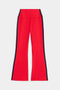 The SPLITS59 Raquel High Waist Crop in Pirate Red/Indigo features black side panels and 4-way stretch fabric for comfort and movement. Laid flat on white, these cropped pants are ideal for yoga with their iconic high-waist Raquel design.