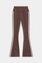 The SPLITS59 Raquel High Waist Flared Legging in Dark Chocolate/Creme features soft spandex, white side stripes, a high-rise waistband, and full-length flared legs, displayed flat on a white background.