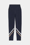 Indigo high waist 7/8 leggings by SPLITS59, featuring luxurious ultra-luxe fabric with white, beige, and brown diagonal stripes near the ankles.