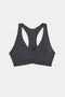 SPLITS59 Mia Rigor Bra in black features a racerback design, showcased on a white background.