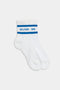 A pair of Logo Stripe Quarter Socks by SPLITS59 in white with blue stripes and "SPLITS59" text near the top.
