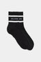 A pair of SPLITS59 Logo Stripe Quarter Socks in black with white bands and the text "splits59 s59" around the ribbed cuffs.