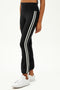A woman wearing black and white stripe Icon High Waist Supplex Legging by SPLITS59.