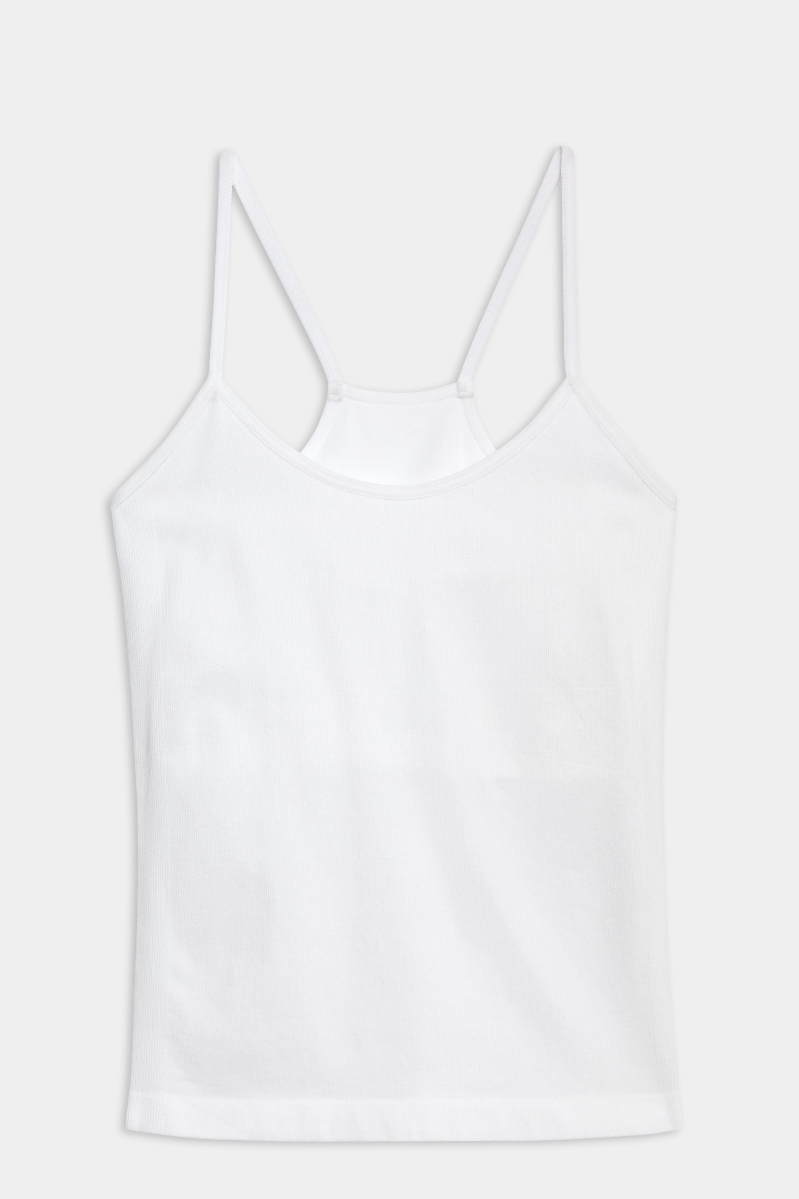 A SPLITS59 Loren Seamless Waist Length Tank - White with a shelf bra on a white background, perfect for gym workouts.